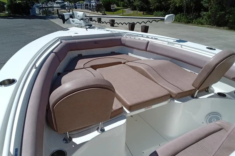 Slide: The Image of 2019 Sea Hunt Ultra 255 SE boat with spacious seating and modern design. - 34