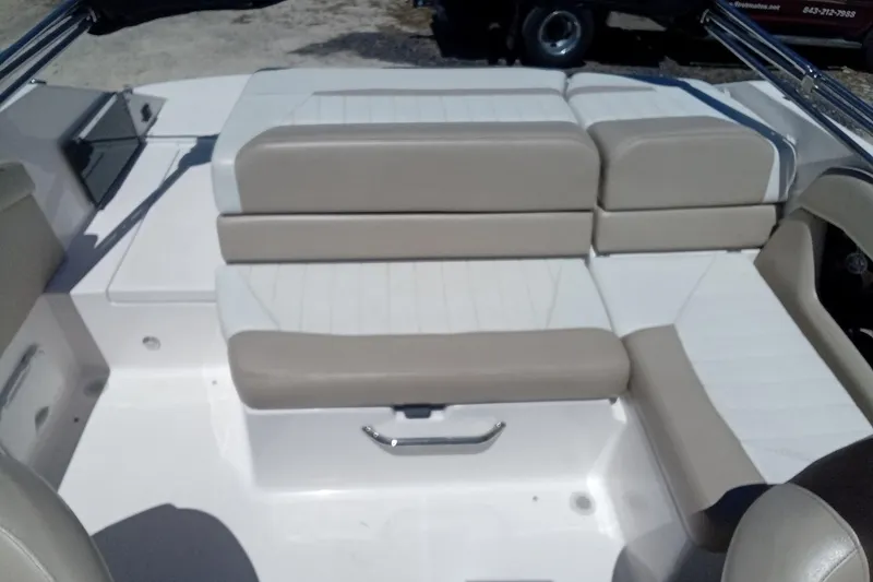 Slide: The Image of 2014 Regal 2000 Bowrider interior with beige and white seating. - 19