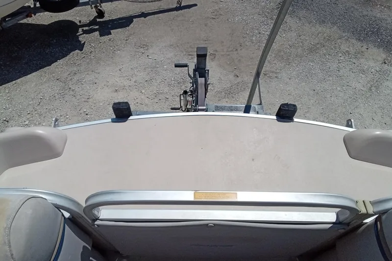 Slide: The Image of 2003 Godfrey SANPAN 2500 pontoon boat interior with seating and railing. - 29