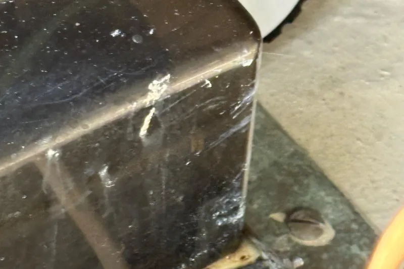 Slide: The Image of 1988 Egg Harbor 37 Convertible yacht interior with wooden accents and ladder. - 10