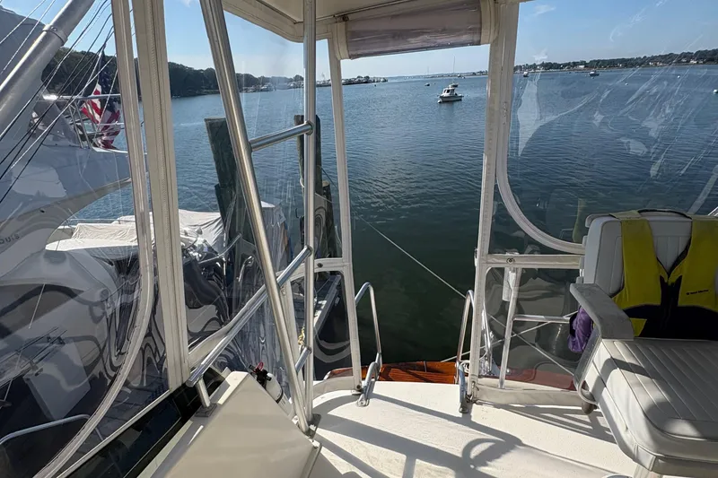 Slide: The Image of Interior of 1988 Egg Harbor 37 Convertible yacht with kitchen and seating area. - 15