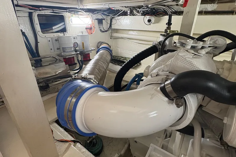 Slide: The Image of Control panels and outlets on a 1988 Egg Harbor 37 Convertible boat. - 16