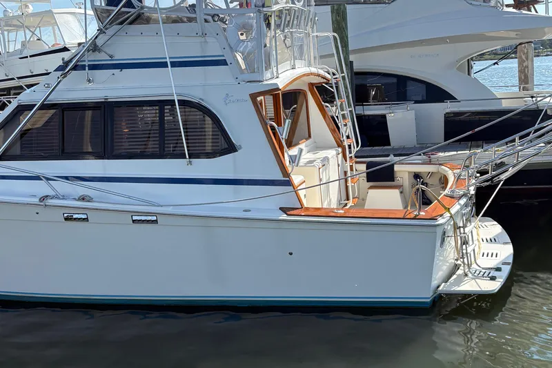 Slide: The Image of Interior of 1988 Egg Harbor 37 Convertible yacht with TV and wooden cabinetry. - 20