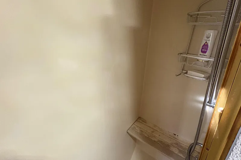 Slide: The Image of Interior of 1988 Egg Harbor 37 Convertible yacht with cozy seating and ocean view. - 21