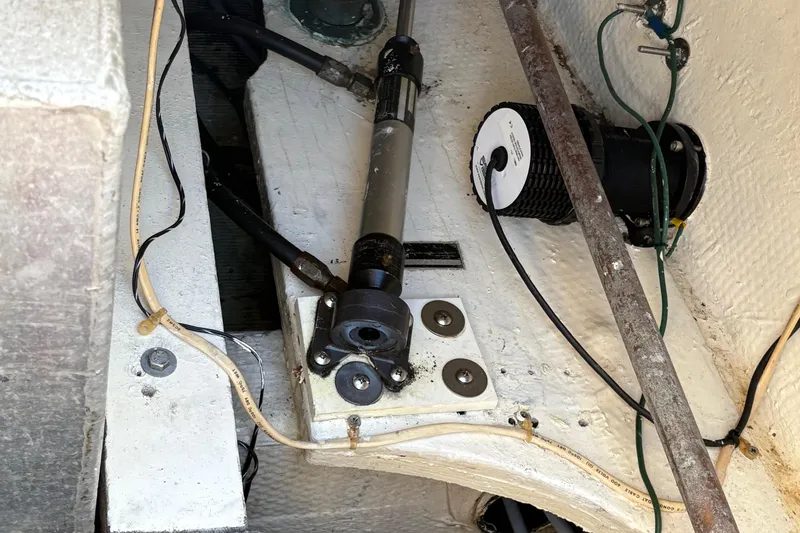 Slide: The Image of 1988 Egg Harbor 37 Convertible helm with Cummins Turbo Diesel controls and steering wheel. - 31