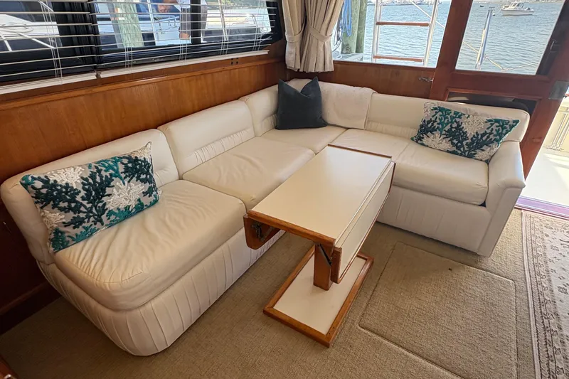 Slide: The Image of Bow of 1988 Egg Harbor 37 Convertible boat with anchor and ropes. - 39