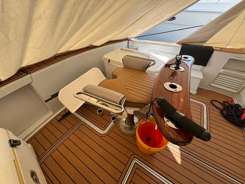 Slide: The Image of 1998 Ocean Yachts 40 Super Sport cockpit with fishing chair and teak flooring. - 18