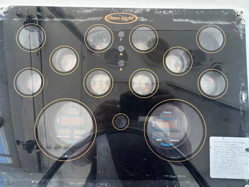 Slide: The Image of Control panel of a 1998 Ocean Yachts 40 Super Sport boat with gauges and dials. - 26