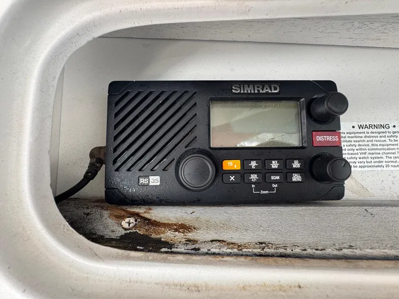 Slide: The Image of Simrad marine radio on 1998 Ocean Yachts 40 Super Sport boat. - 46