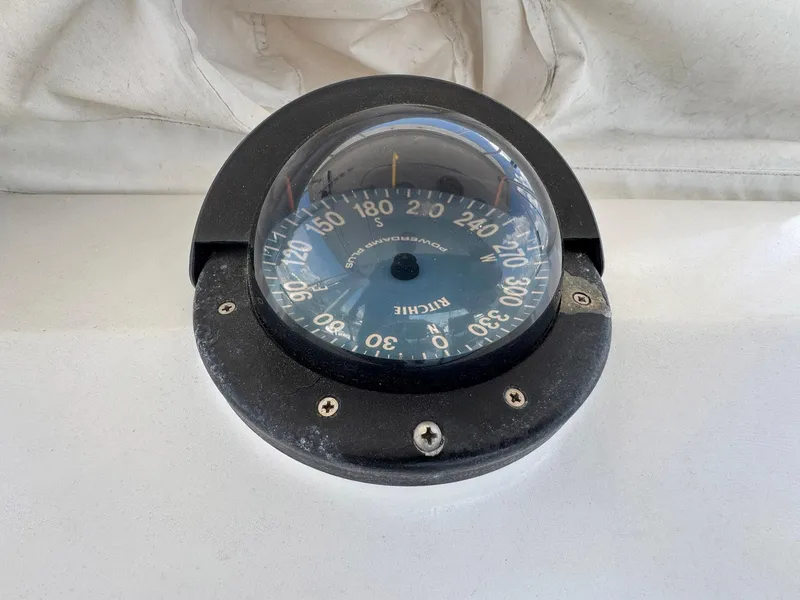 Slide: The Image of Compass on 1998 Ocean Yachts 40 Super Sport boat dashboard. - 49