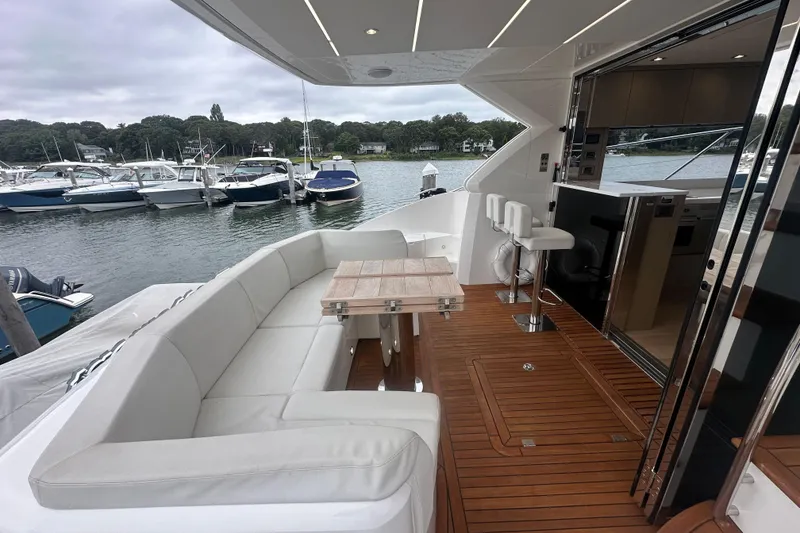 Slide: The Image of Luxurious 2018 Sunseeker Manhattan 52 yacht with elegant seating and modern interior design. - 12