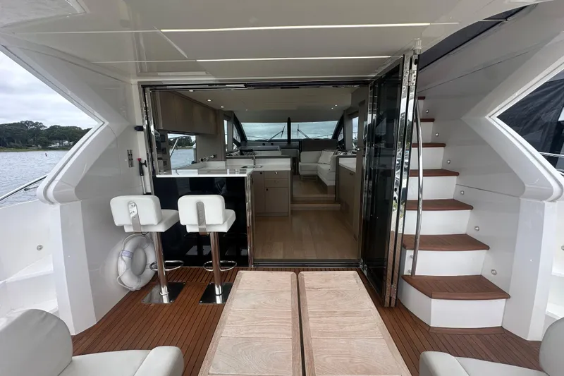 Slide: The Image of 2018 Sunseeker Manhattan 52 yacht interior with modern design and wooden flooring. - 13