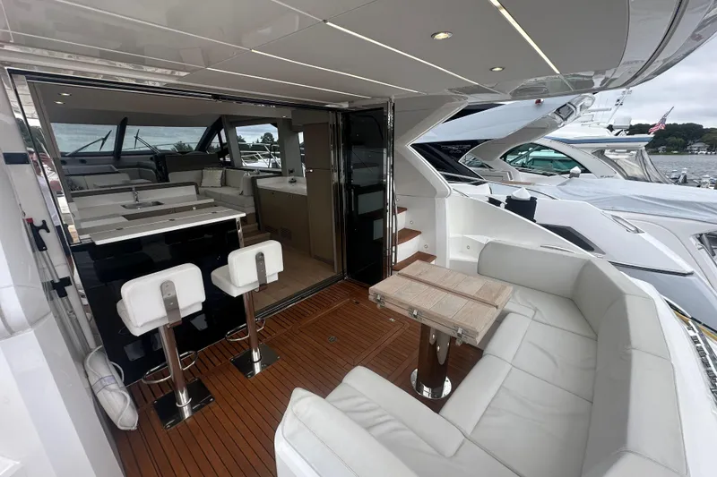 Slide: The Image of Luxurious 2018 Sunseeker Manhattan 52 yacht interior with elegant seating and modern design. - 14