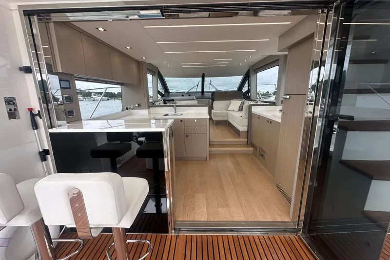 Slide: The Image of Luxurious interior of 2018 Sunseeker Manhattan 52 yacht with modern furnishings and open layout. - 16