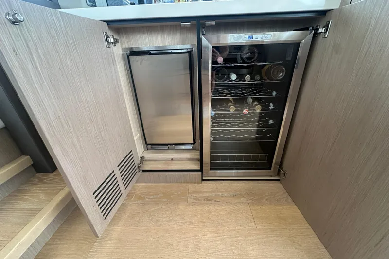 Slide: The Image of Wine cooler and mini fridge in 2018 Sunseeker Manhattan 52 yacht interior. - 21