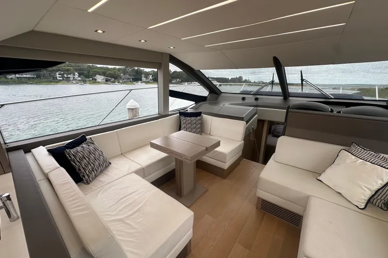 Slide: The Image of Luxurious interior of 2018 Sunseeker Manhattan 52 yacht with elegant seating and scenic views. - 25