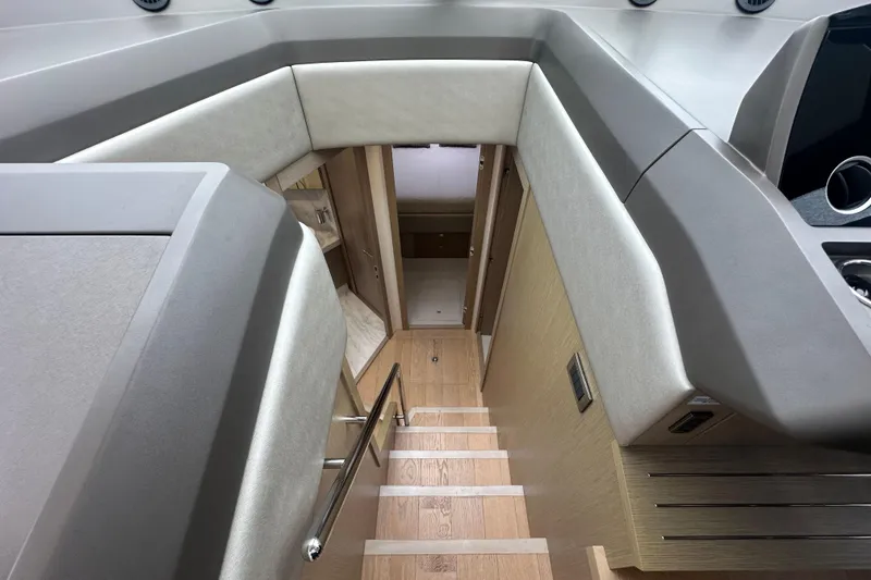 Slide: The Image of Interior view of 2018 Sunseeker Manhattan 52 yacht, featuring modern staircase and sleek design. - 39