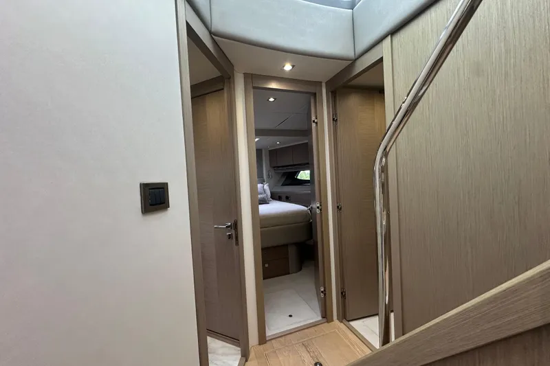 Slide: The Image of Interior view of 2018 Sunseeker Manhattan 52 yacht, featuring a cozy bedroom and modern design. - 40