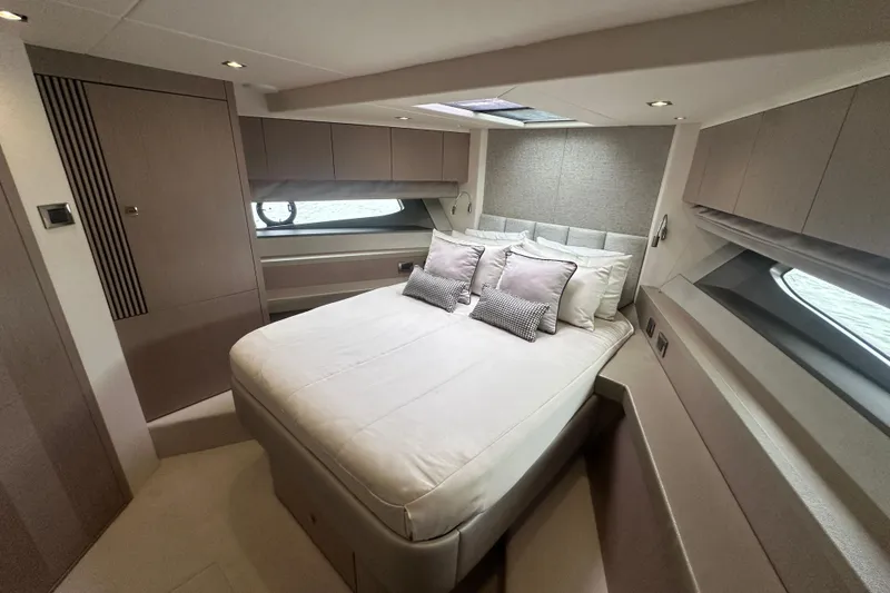 Slide: The Image of Luxurious bedroom interior of 2018 Sunseeker Manhattan 52 yacht with modern design and cozy bedding. - 46