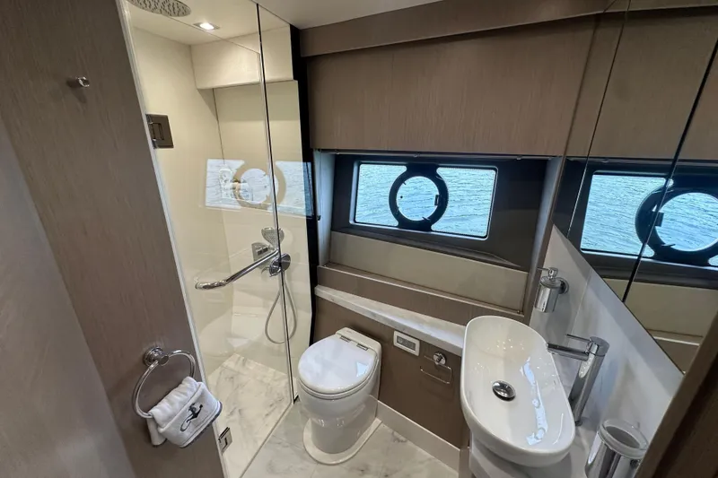 Slide: The Image of Luxurious bathroom in 2018 Sunseeker Manhattan 52 yacht with modern fixtures and ocean view. - 49
