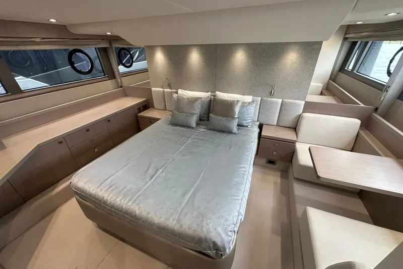 Slide: The Image of Luxurious 2018 Sunseeker Manhattan 52 yacht bedroom with elegant furnishings and modern design. - 57