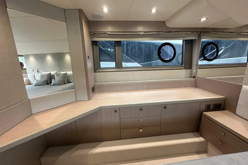 Slide: The Image of Luxurious interior of 2018 Sunseeker Manhattan 52 yacht with modern furnishings and ample storage. - 60