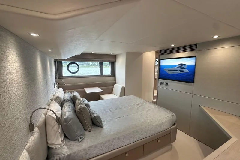 Slide: The Image of Luxurious interior of 2018 Sunseeker Manhattan 52 yacht with modern bedroom and TV. - 62