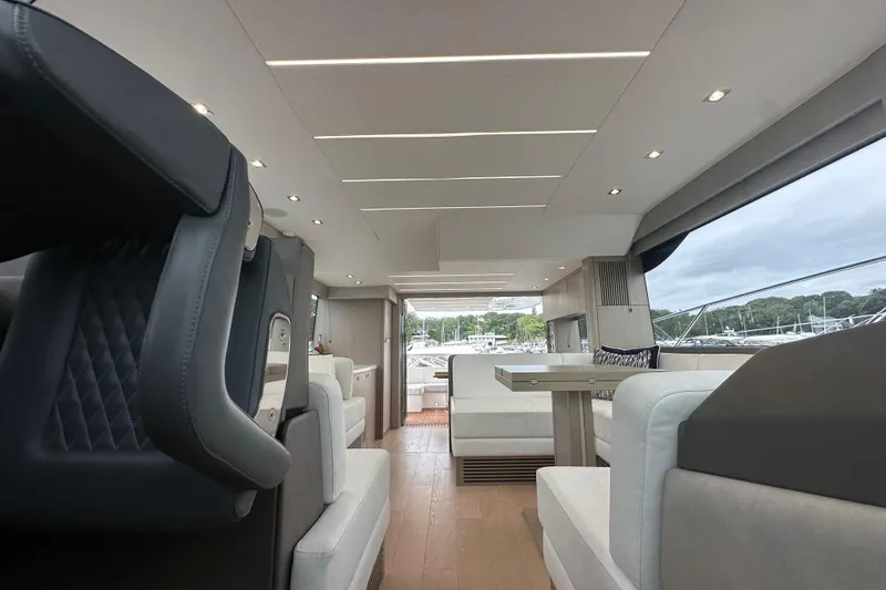 Slide: The Image of Luxurious interior of 2018 Sunseeker Manhattan 52 yacht, featuring modern seating and elegant design. - 64