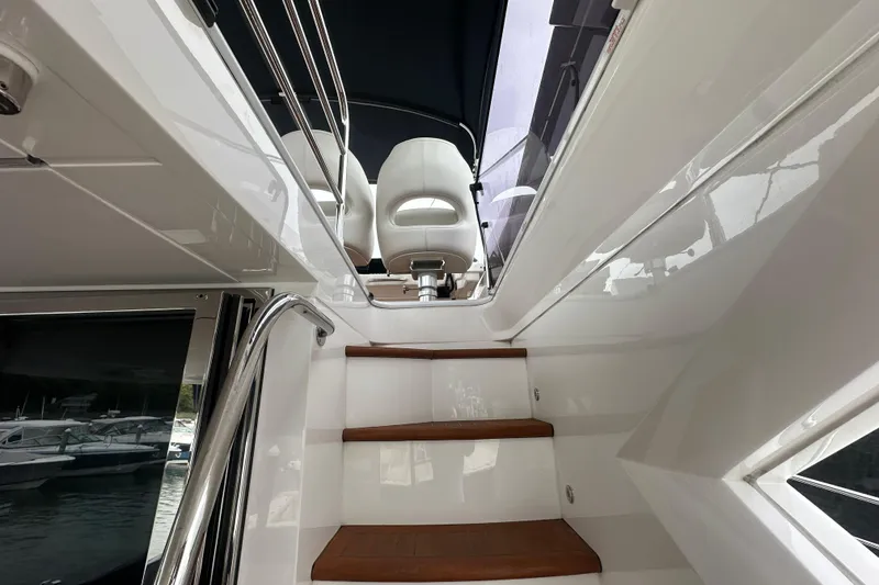 Slide: The Image of Staircase leading to upper deck of 2018 Sunseeker Manhattan 52 yacht. - 71