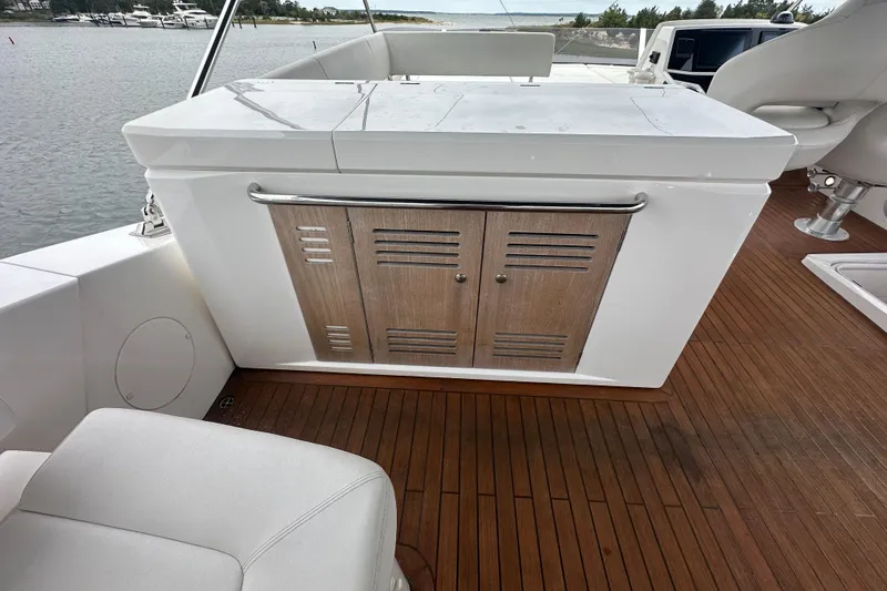Slide: The Image of 2018 Sunseeker Manhattan 52 yacht interior with wooden flooring and sleek cabinetry. - 73