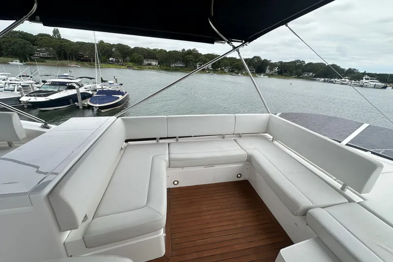 Slide: The Image of Luxurious 2018 Sunseeker Manhattan 52 yacht with spacious outdoor seating area. - 79