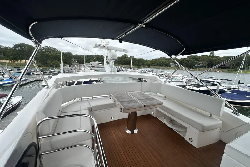 Slide: The Image of 2018 Sunseeker Manhattan 52 yacht with spacious deck and seating area. - 83