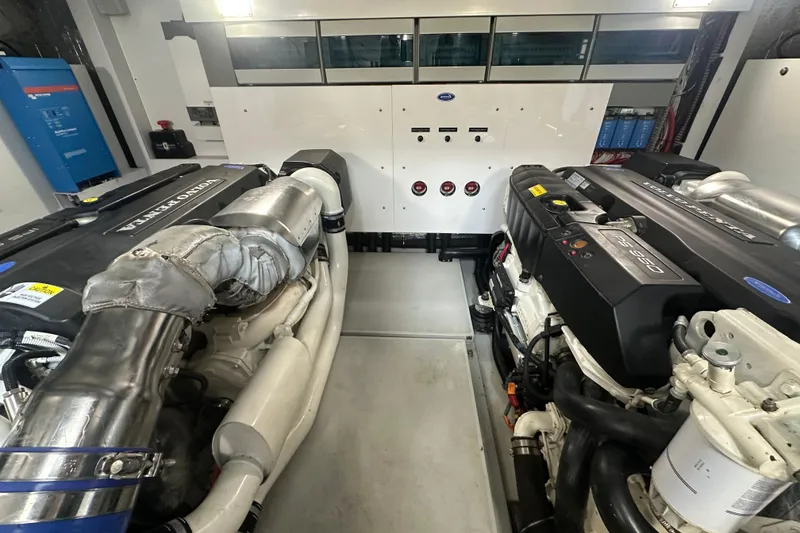 Slide: The Image of Engine room of 2018 Sunseeker Manhattan 52 yacht, featuring twin engines and control systems. - 89