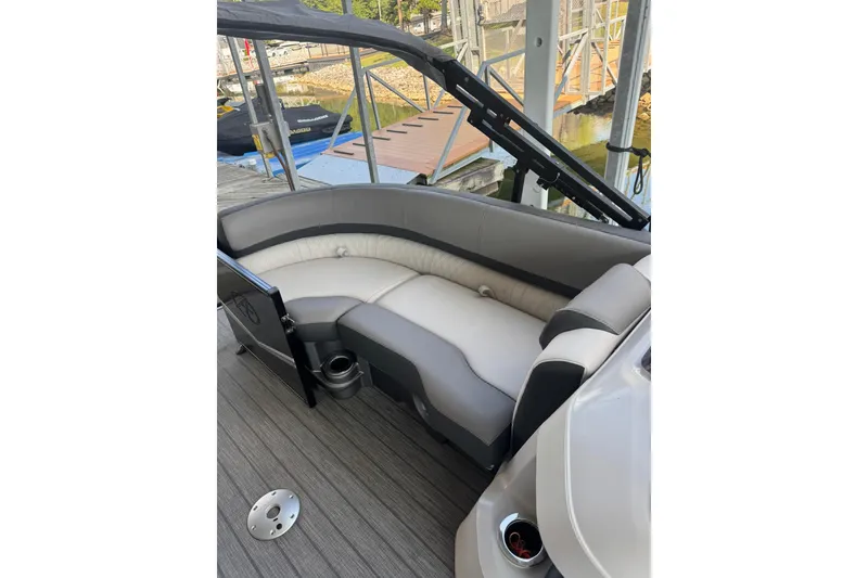 Slide: The Image of 2021 Avalon LSZ Entertainer 24' boat with sleek seating and modern design. - 8