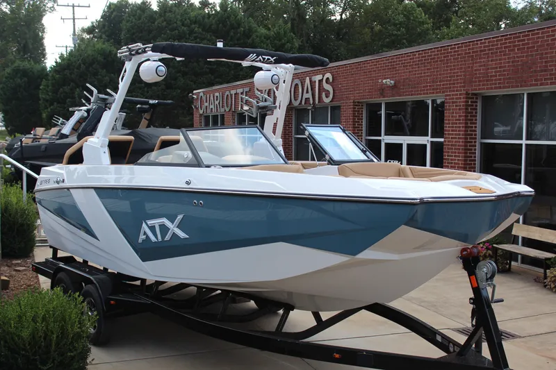 The Image of 2026 ATX Surf Boats 22 Type-S displayed at dealership, featuring sleek design and modern features. - 1