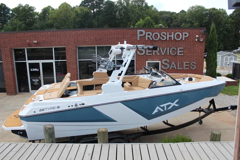 Slide: The Image of 2026 ATX Surf Boats 22 Type-S displayed at a pro shop, ready for sale. - 6