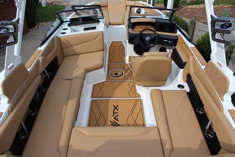 Slide: The Image of 2026 ATX Surf Boats 22 Type-S interior with tan seating and modern dashboard design. - 8