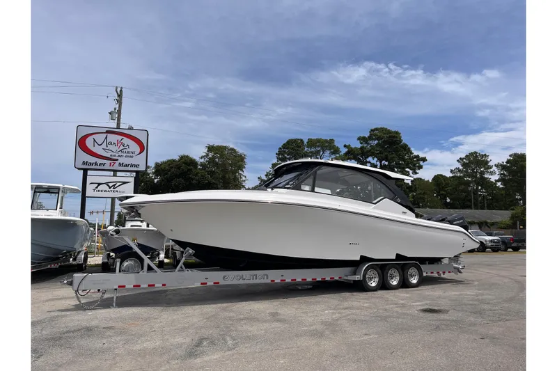 The Image of 2025 Fountain 39 DX boat on trailer at Marker 17 Marine dealership. - 0