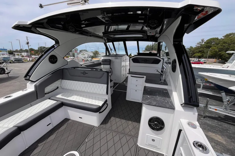 Slide: The Image of 2025 Fountain 39 DX boat interior with sleek seating and modern design features. - 11