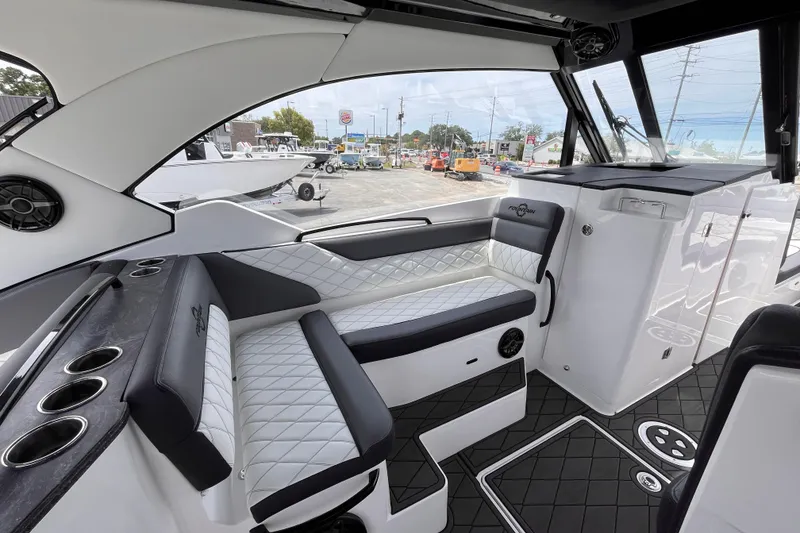Slide: The Image of Interior of 2025 Fountain 39 DX boat with luxurious seating and modern design. - 17