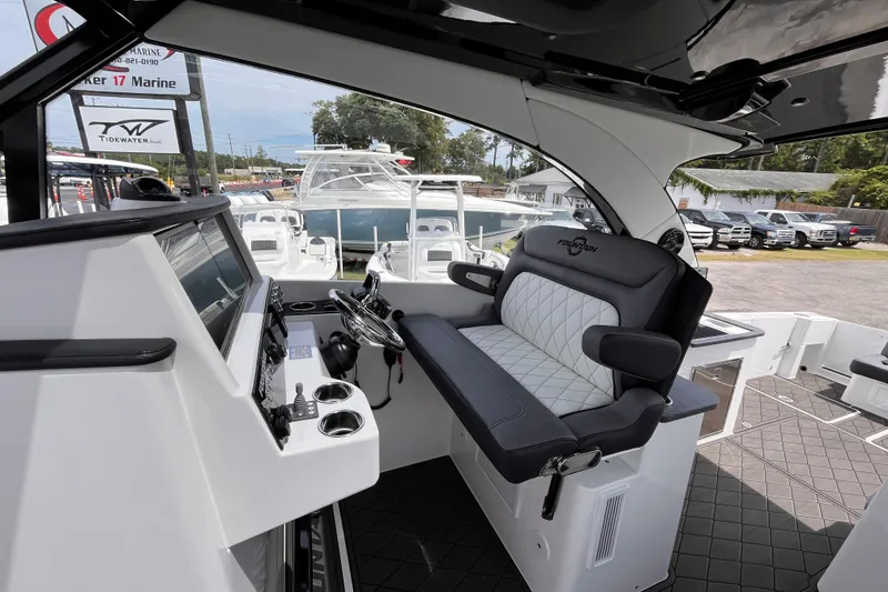 Slide: The Image of Interior of 2025 Fountain 39 DX boat with modern helm and seating. - 20