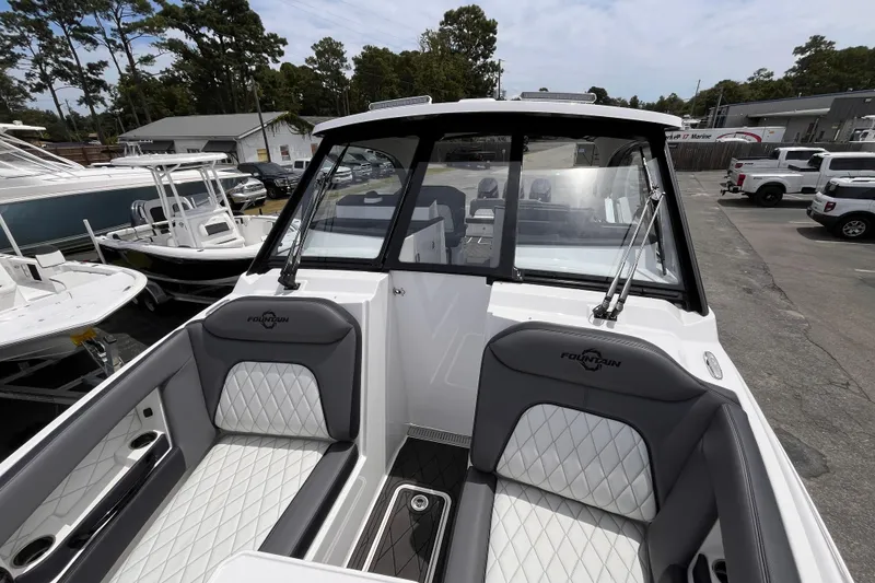 Slide: The Image of 2025 Fountain 39 DX boat interior with sleek seating and modern design. - 29