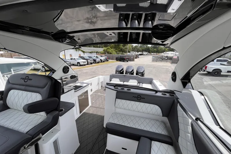 Slide: The Image of Luxurious 2025 Fountain 39 DX boat interior with plush seating and modern amenities. - 30
