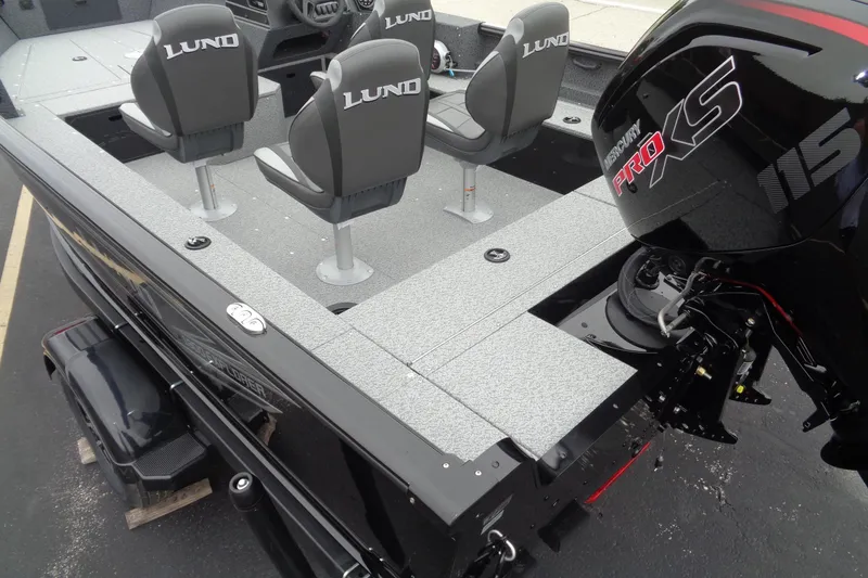 Slide: The Image of 2026 Lund 1800 Explorer SS boat interior with Mercury Pro XS engine. - 7