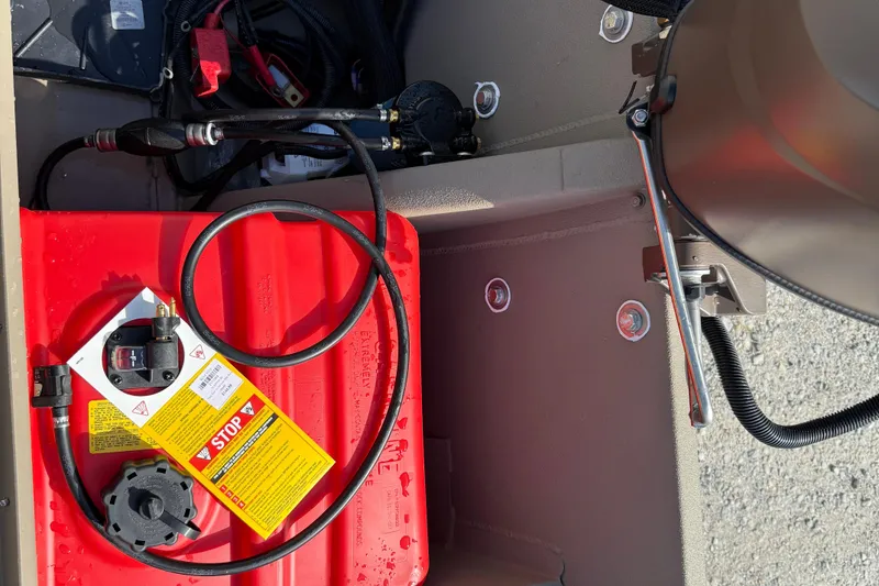 Slide: The Image of 2025 Alweld 1756 V MARSH C.C. boat interior with red fuel tank and wiring. - 12