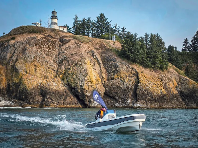 The Image of 2026 Aspen Carbon Cat T13C boat on trailer outdoors. - 0