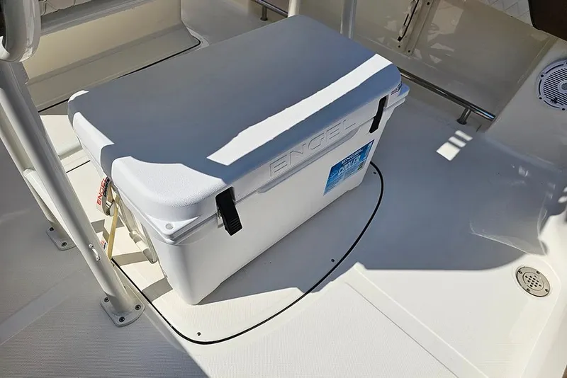Slide: The Image of Cooler on deck of 2026 Pioneer 202 Islander boat, Engel brand, secured with straps. - 25
