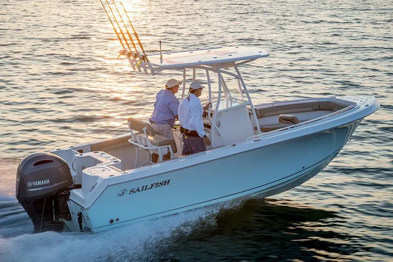The Image of Manufacturer Provided Image: 2022 Sailfish 220 CC boat cruising on water at sunset. - 0
