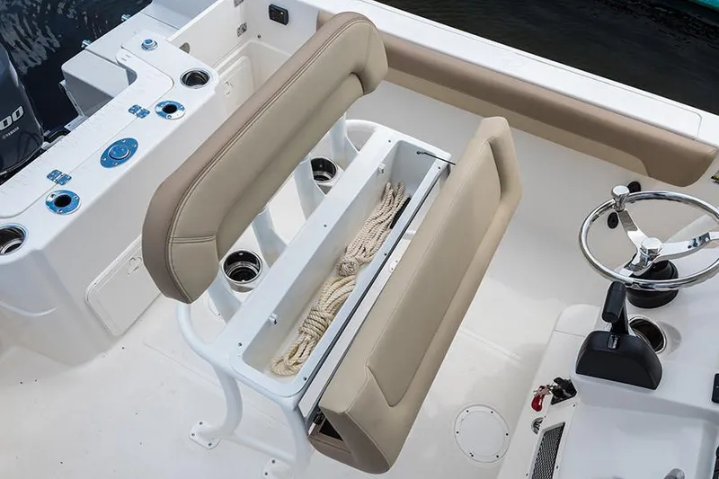 Slide: The Image of Manufacturer Provided Image: 2022 Sailfish 220 CC boat interior with storage compartment and seating. - 11