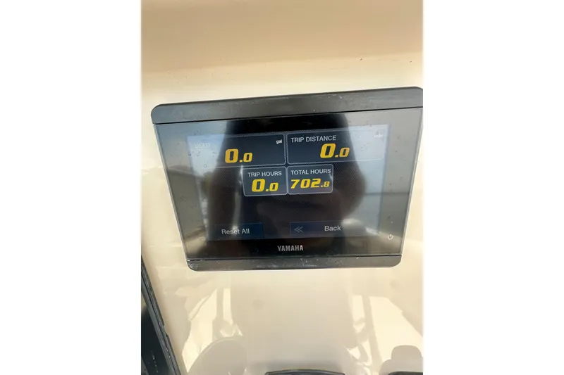 Slide: The Image of Yamaha display on 2022 Sailfish 220 CC showing trip and total hours. - 26